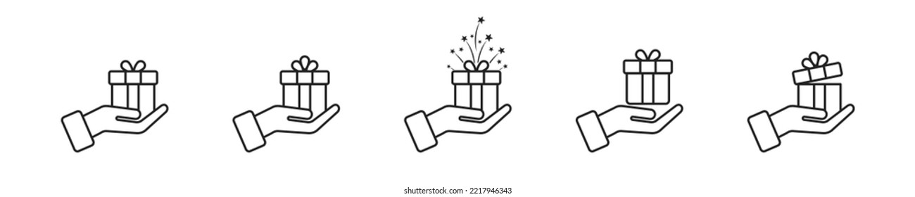 Caja de regalo en mano. Caja de regalo de mano Ilustración vectorial.  EPS 10.