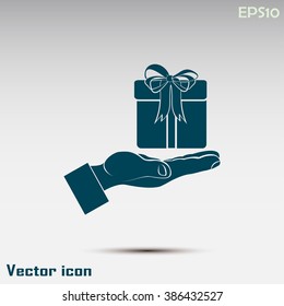 Gift box and hand icon