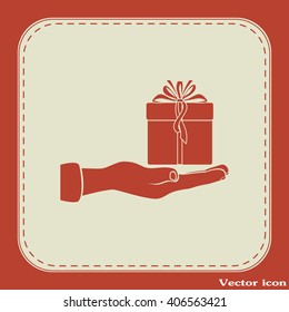 Gift box and hand icon