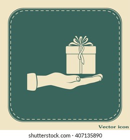 Gift box and hand icon