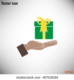 Gift box and hand icon