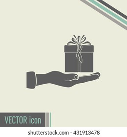 Gift box and hand icon