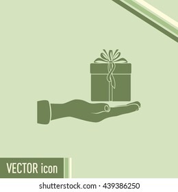 Gift box and hand icon