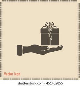 Gift box and hand icon