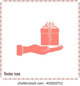 Gift box and hand icon