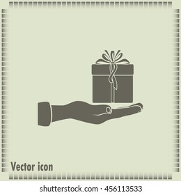 Gift box and hand icon