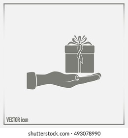 Gift box and hand icon