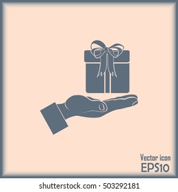 Gift box and hand icon