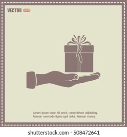Gift box and hand icon
