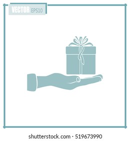 Gift box and hand icon