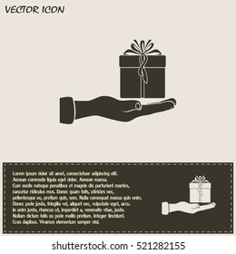 Gift box and hand icon
