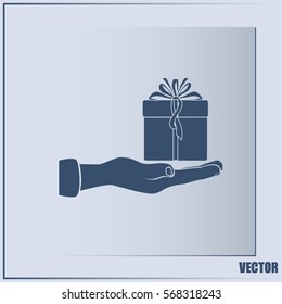 Gift box and hand icon