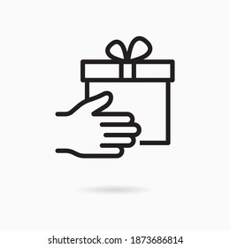 Gift box in hand line icon. Vector illustration on white background.