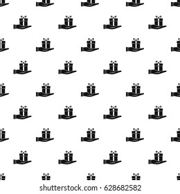 Gift box in hand pattern seamless in simple style vector illustration