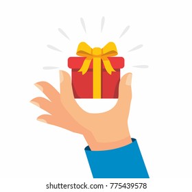 Gift box in hand. Vector flat illustration