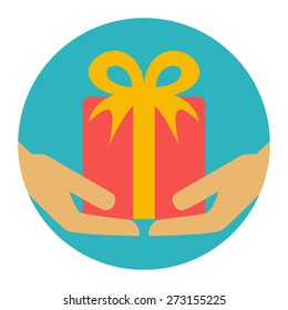Gift box in hands. Flat design vector illustration
