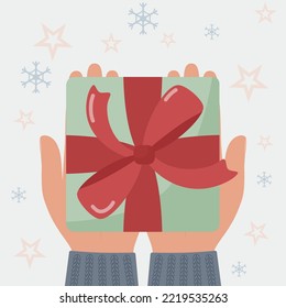 Gift box in hands. Flat style. Vector illustration 