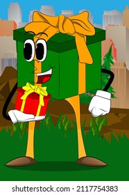 Gift Box with holding small gift box as a cartoon character. Holiday, Celebration surprise with happy face emotion.