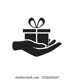 icono de caja de regalo en la mano. ilustración vectorial de signo de regalo