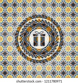 gift box icon inside arabesque style badge. arabic decoration.