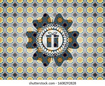 gift box icon inside arabesque badge background. arabic decoration.