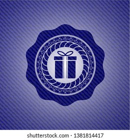 gift box icon inside badge with denim background