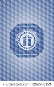 gift box icon inside blue badge with geometric pattern.