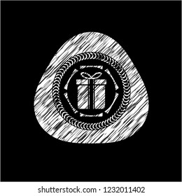 gift box icon inside chalkboard emblem on black board