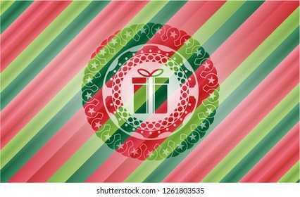 gift box icon inside christmas colors style emblem.