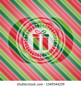 gift box icon inside christmas emblem background.