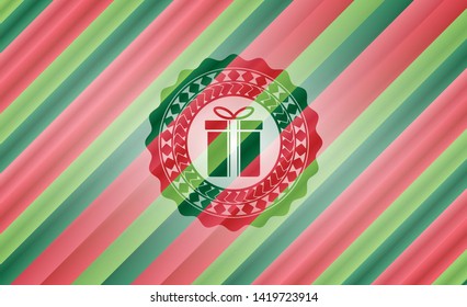 gift box icon inside christmas badge.
