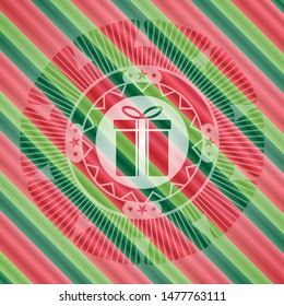 gift box icon inside christmas badge background.
