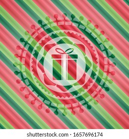 gift box icon inside christmas colors badge.