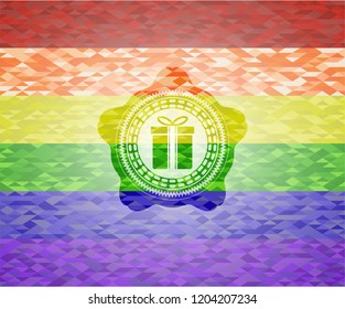 gift box icon inside emblem on mosaic background with the colors of the LGBT flag