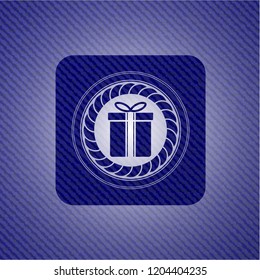 gift box icon inside emblem with jean background