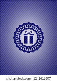gift box icon inside emblem with jean texture