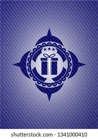 gift box icon inside emblem with denim texture
