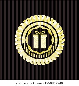 gift box icon inside gold shiny badge