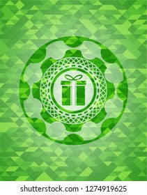 gift box icon inside green mosaic emblem