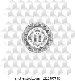 gift box icon inside grey badge with geometric cube white background