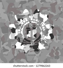 gift box icon inside grey camouflage texture