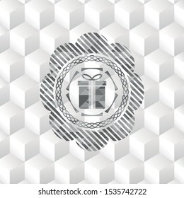 gift box icon inside grey emblem with cube white background