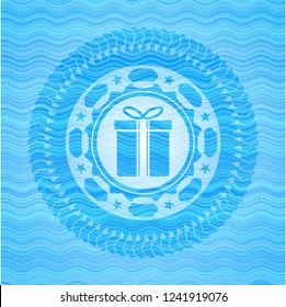 gift box icon inside light blue water style badge.