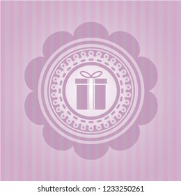 gift box icon inside pink emblem