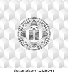 gift box icon inside realistic grey emblem with cube white background