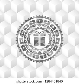 gift box icon inside realistic grey emblem with geometric cube white background