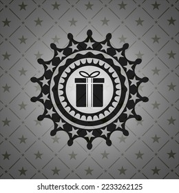 gift box icon inside realistic black emblem. 