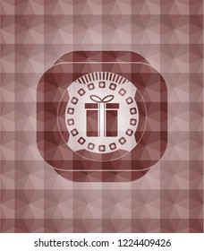 gift box icon inside red seamless emblem or badge with abstract geometric polygonal pattern background.