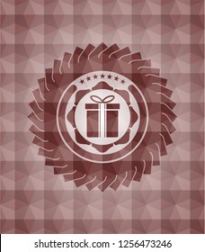 gift box icon inside red seamless emblem or badge with abstract geometric pattern background.