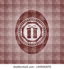 gift box icon inside red seamless emblem or badge with geometric pattern background.